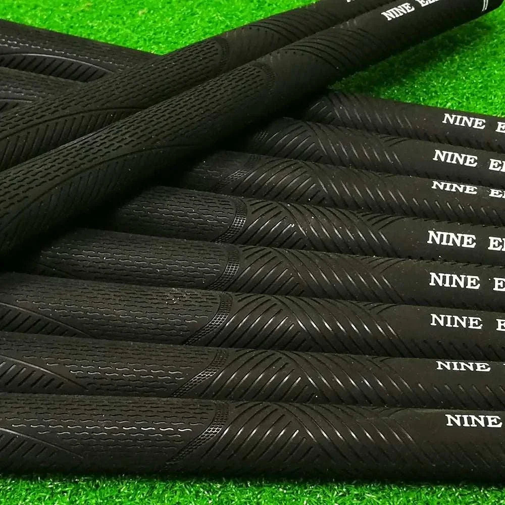 10 pcs Golf grips with rubber material and anti-slip pattern design on green turf background.
