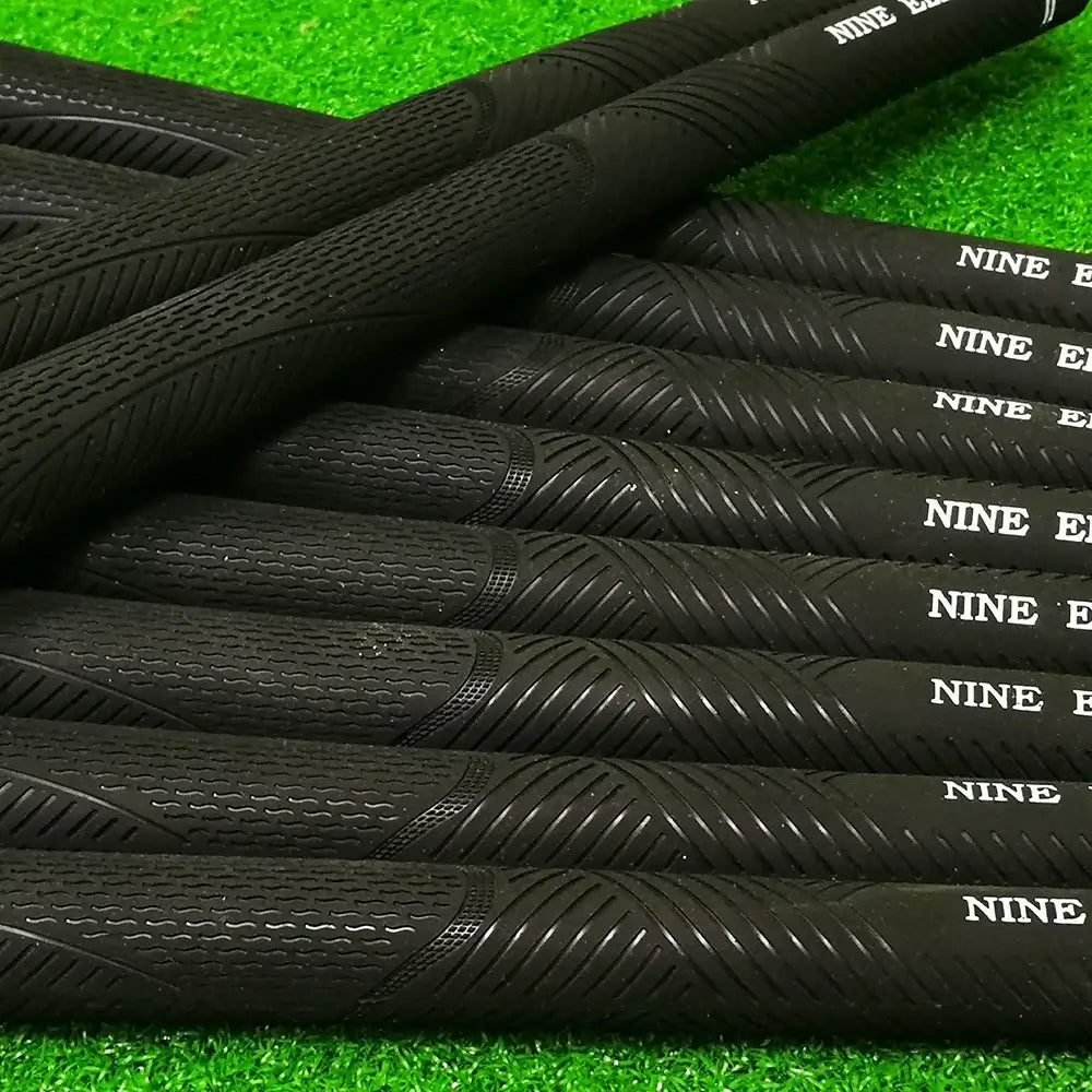 10 pcs Golf grips with rubber material and anti-slip pattern design on green turf background.