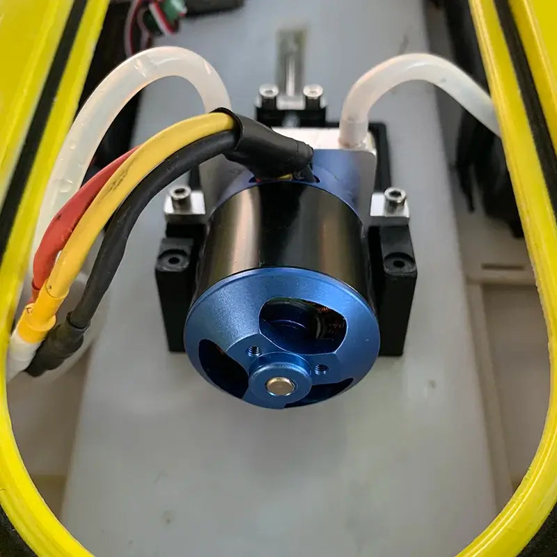 Large Remote Control Boat internal motor image showcasing blue high-performance motor components.