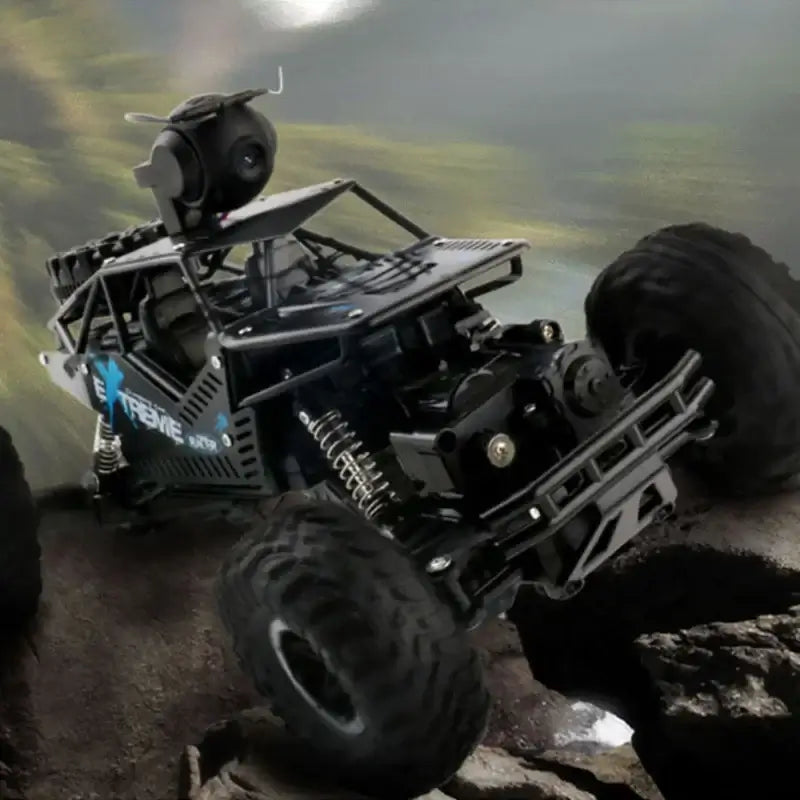 HD WIFI camera control car racing over rocky terrain with remote control functionality.