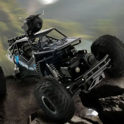 HD WIFI camera control car racing over rocky terrain with remote control functionality.
