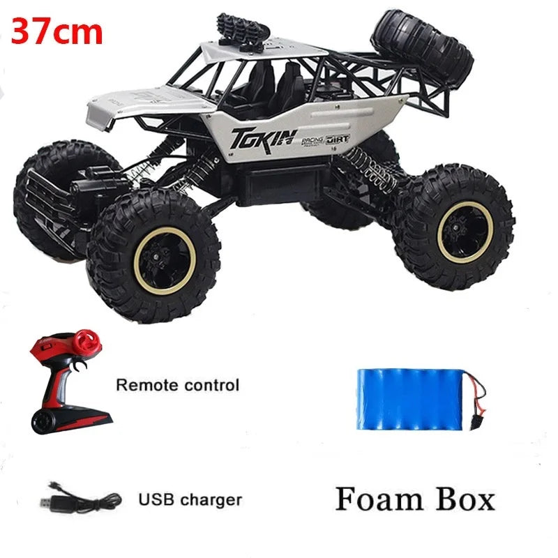 Remote control cars with LED lights 4WD RC car 37cm with remote control, USB charger, and foam box.