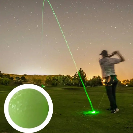 Golfer using a Glowing Golf Ball For Night Training, showcasing a fluorescent green trajectory under a starry sky.