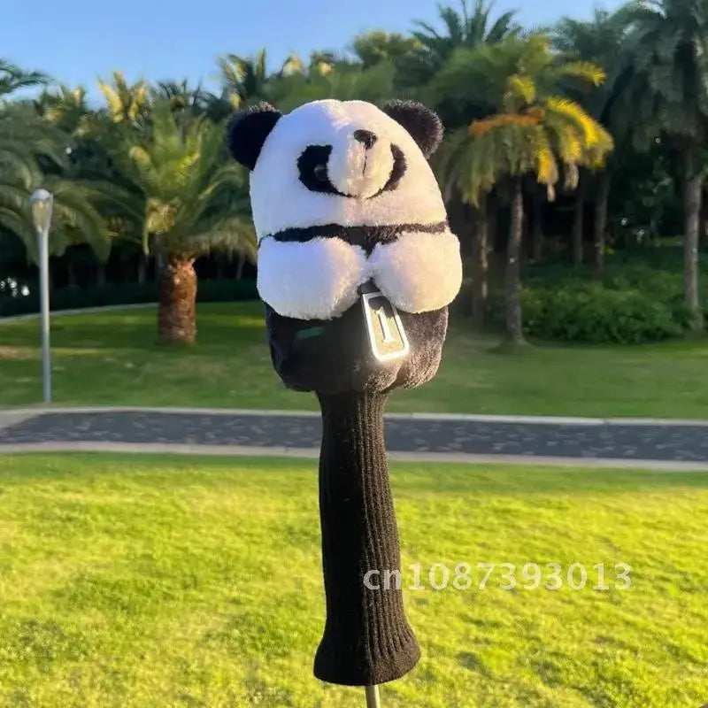 Cartoon Animal Golfing Club Cover featuring a plush panda on a golf club in a sunny outdoor setting.