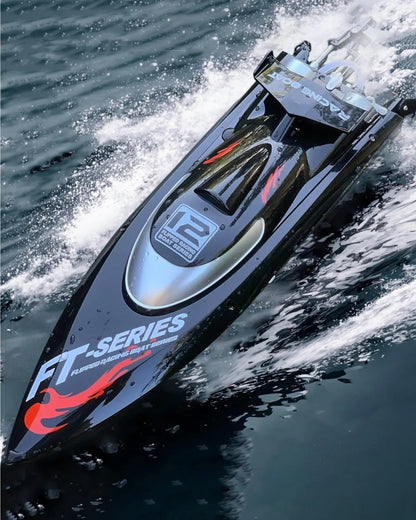 RC Speed Boat 2.4G 4WD 55KMH model FT-Series racing on water with speed and precision.