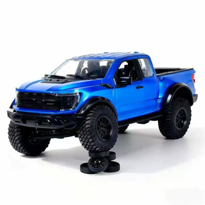 F-150 Raptor RC truck 1:12 scale with large tires, showcasing off-road capabilities and detailed design.