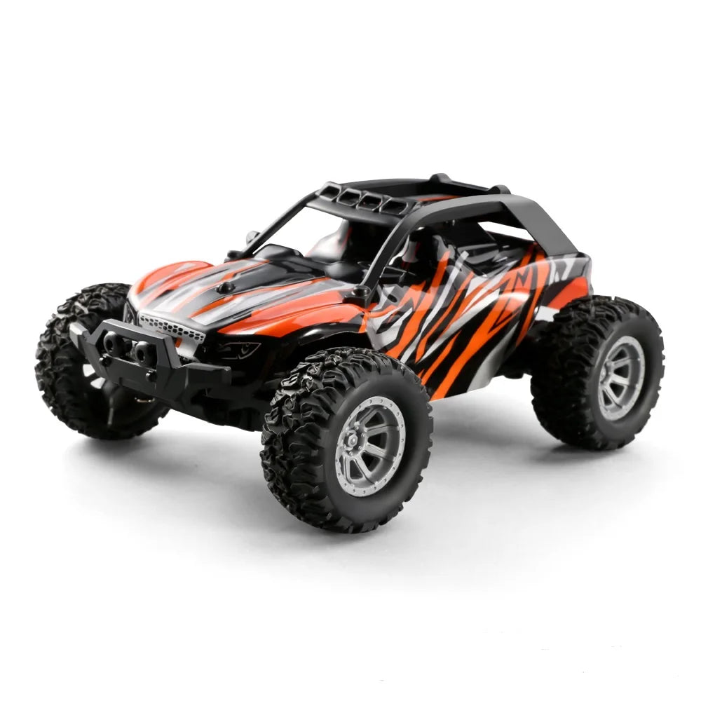High speed RC car 1:32 scale model with vibrant design and robust tires for outdoor adventures.