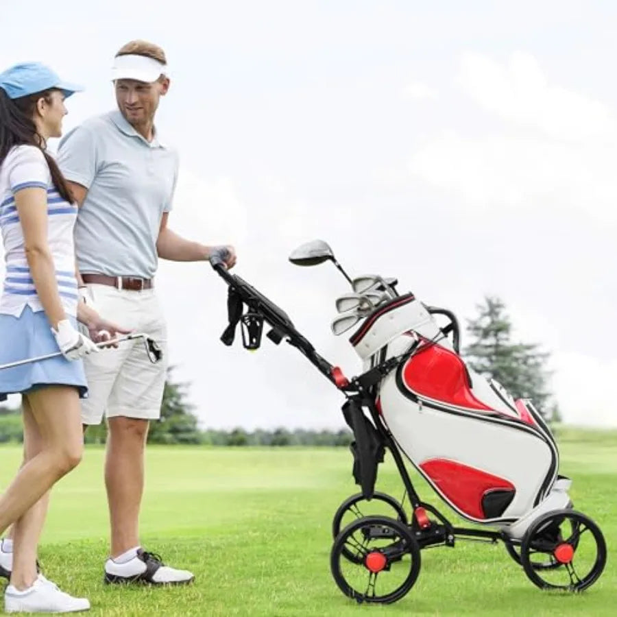 A man and woman enjoying golf, standing next to a 4-wheel golf push cart on a green field.