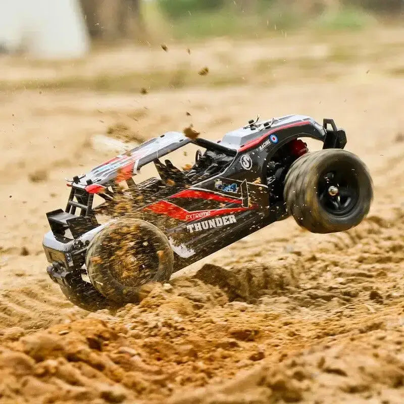 Remote Control Car - All-Terrain speeding through dirt at high speed, showcasing off-road capabilities.
