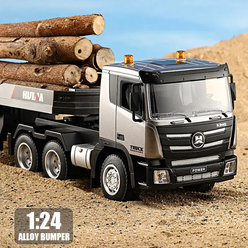 Huina RC Flat Truck Model carrying logs on a sandy terrain, showcasing detailed alloy bumper and 1:24 scale.