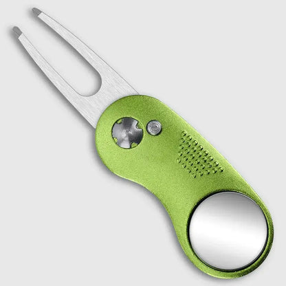 Metal Foldable Golf Divot Repair Tool in green with a mirror and fork-like prongs for golf course maintenance.