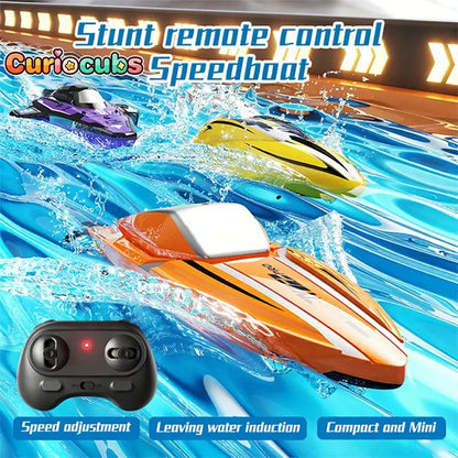 RC Racing Speedboat Mini Remote Control Stunt Boat speeding through water with remote controller in view.