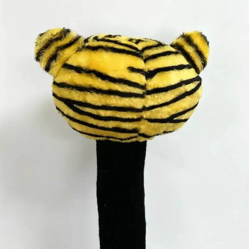 Personalized tiger golf driver headcover featuring a lively tiger design with black stripes and soft plush texture.