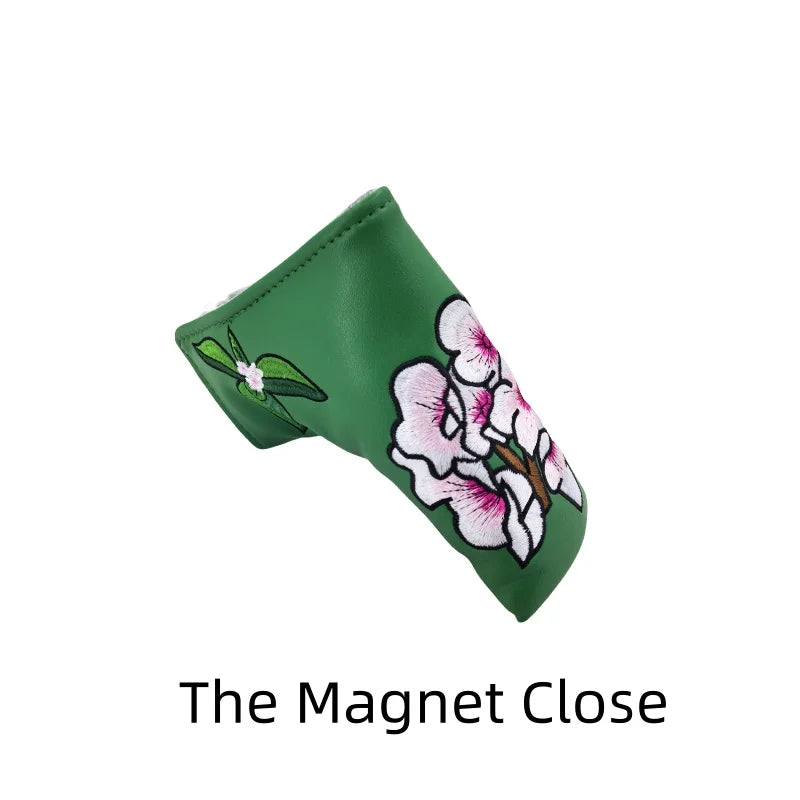 flower embroidery golf club head covers featuring a green design with delicate flower embroidery.