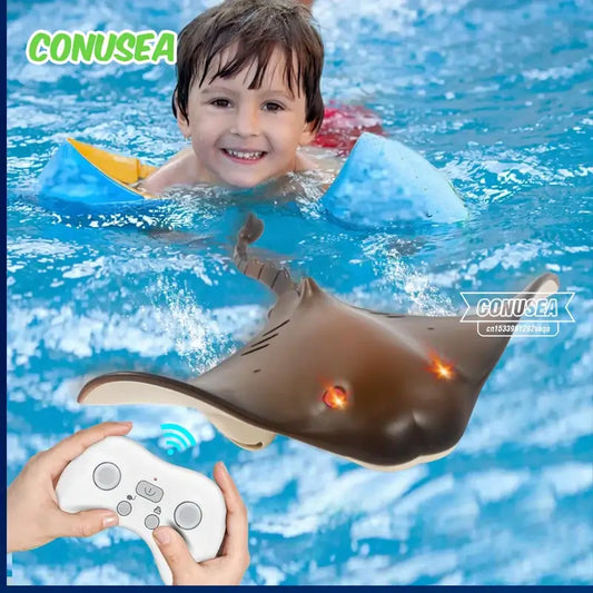 Child playing with RC Boat 2.4G Remote Control Manta Ray Robot Toy in water with remote controller, enjoying summer fun.