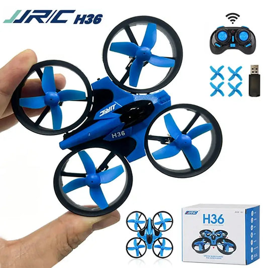 jjrc H36 Mini Drone 3D Flip with remote and accessories in hand, showcasing its compact design and blue color.