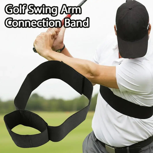 Elastic Swing Golf Swing arm band used by a golfer to enhance swing mechanics during practice.