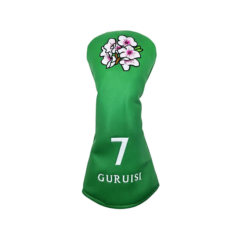 flower embroidery golf club head covers with green design and flower motif for driver and fairway woods protection.