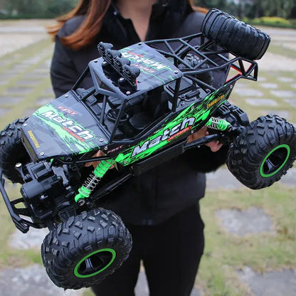 RC Car Remote Control Climbing Vehicle being held outdoors, showcasing its rugged design for all terrain adventures.