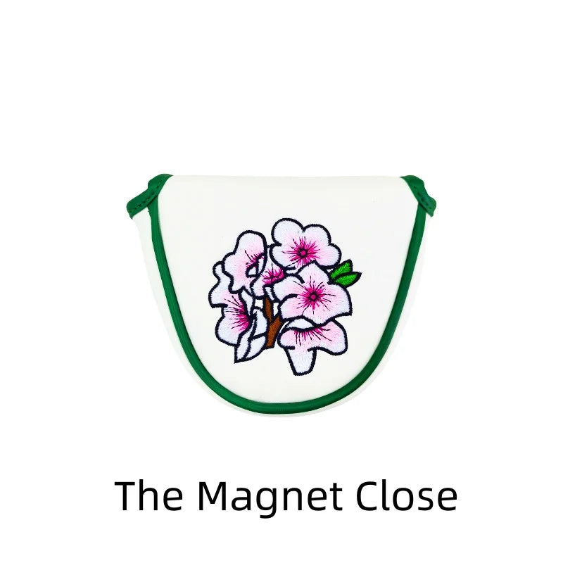 flower embroidery golf club head covers featuring a pink flower design and magnetic closure for drivers and fairway woods.
