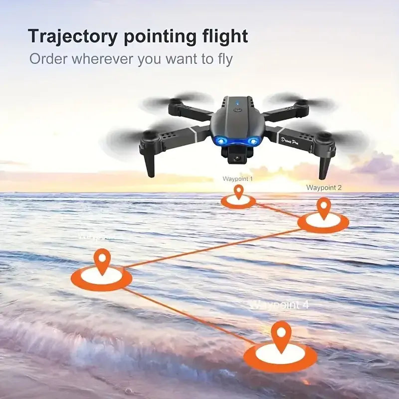 E99 PRO drone with dual camera flying over ocean with trajectory points and waypoints marked on the water surface.