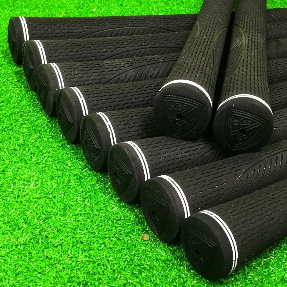 10 pcs Golf grips featuring anti-slip rubber design on green turf background.