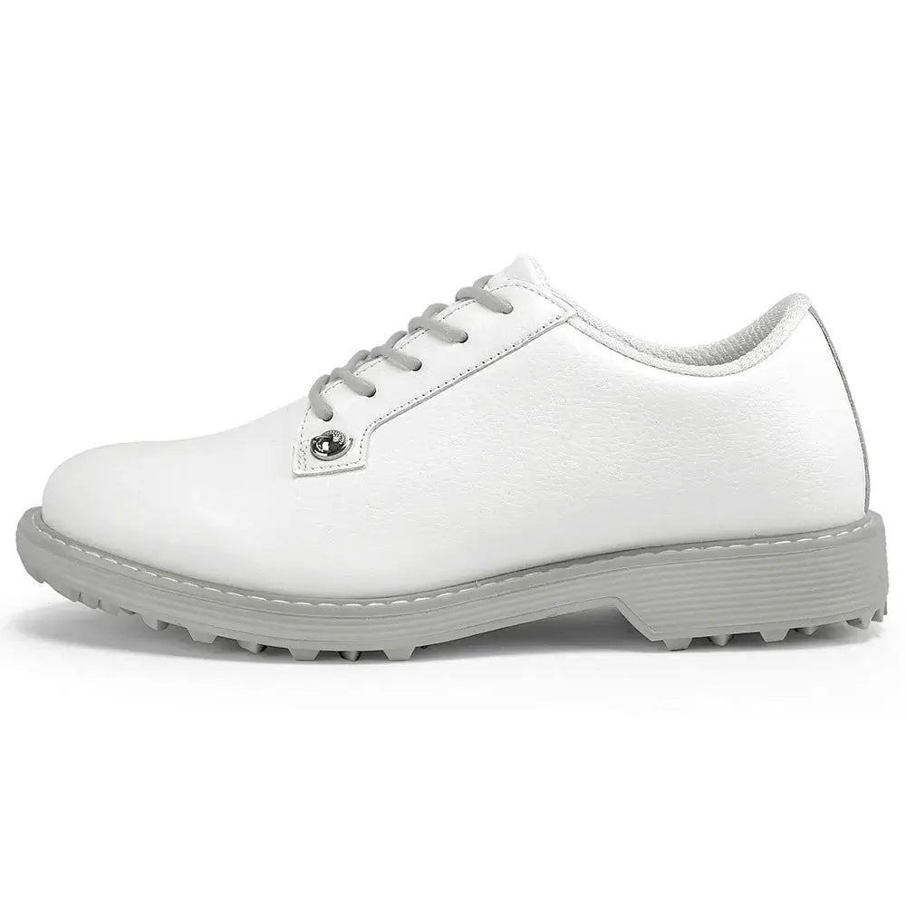 women's leather golf shoes in white with cushioned footbed and responsive sole for comfort and support on the course.