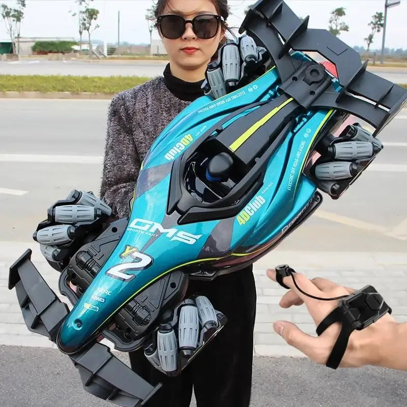 Y2 RC Car Drift Car with Light held by a woman in sunglasses, showcasing its vibrant design and features outdoors.