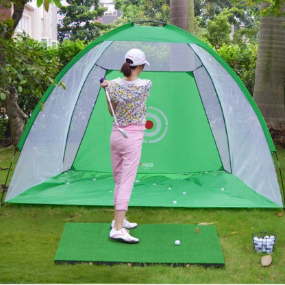 Indoor golf practice net set up in a garden, featuring a woman practicing her swing with golf balls.