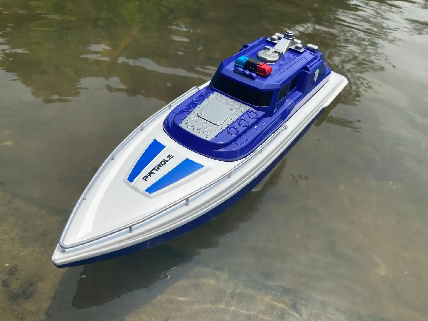 Super large remote control yacht floating on water, perfect for outdoor lakes and fun activities.