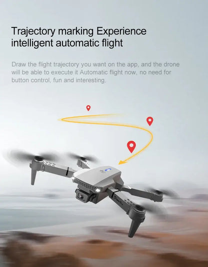 New E88 RC Drone demonstrating trajectory marking and intelligent automatic flight features in a scenic background.