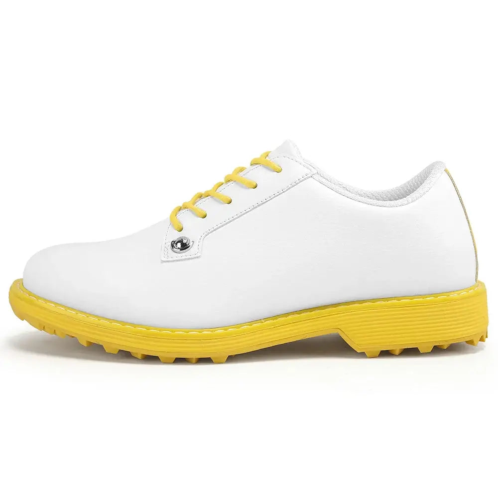 women's leather golf shoes in white with yellow sole for comfortable golfer footwear on the course