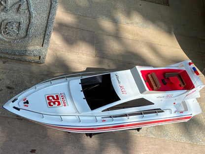 Super large remote control yacht with a sleek design, featuring red and white colors, ideal for outdoor lakes.