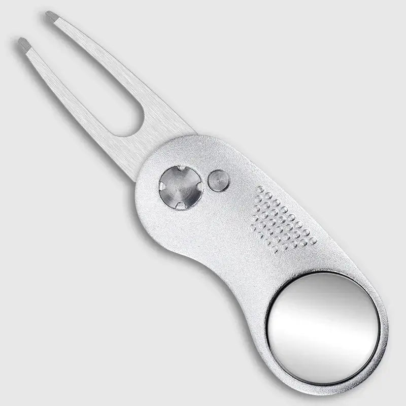 Metal Foldable Golf Divot Repair Tool with silver finish and mirror detail, designed for maintaining golf greens.