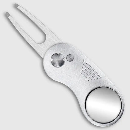 Metal Foldable Golf Divot Repair Tool with silver finish and mirror detail, designed for maintaining golf greens.