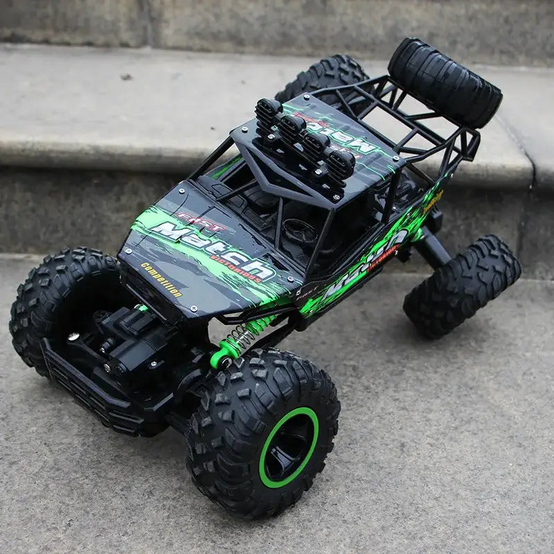 RC Car Remote Control Climbing Vehicle on outdoor terrain with rugged tires for all terrain performance.