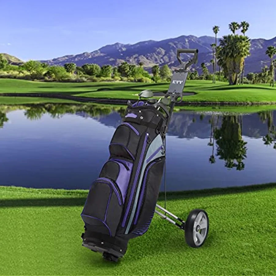2-wheel aluminum frame golf push cart on a golf course near a lake with mountains in the background.