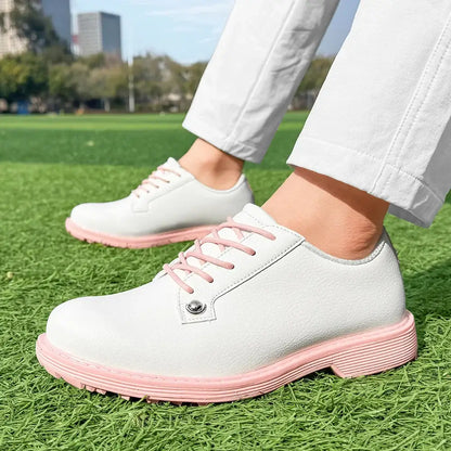 women's leather golf shoes on grassy course, comfortable golfer footwear with stylish design