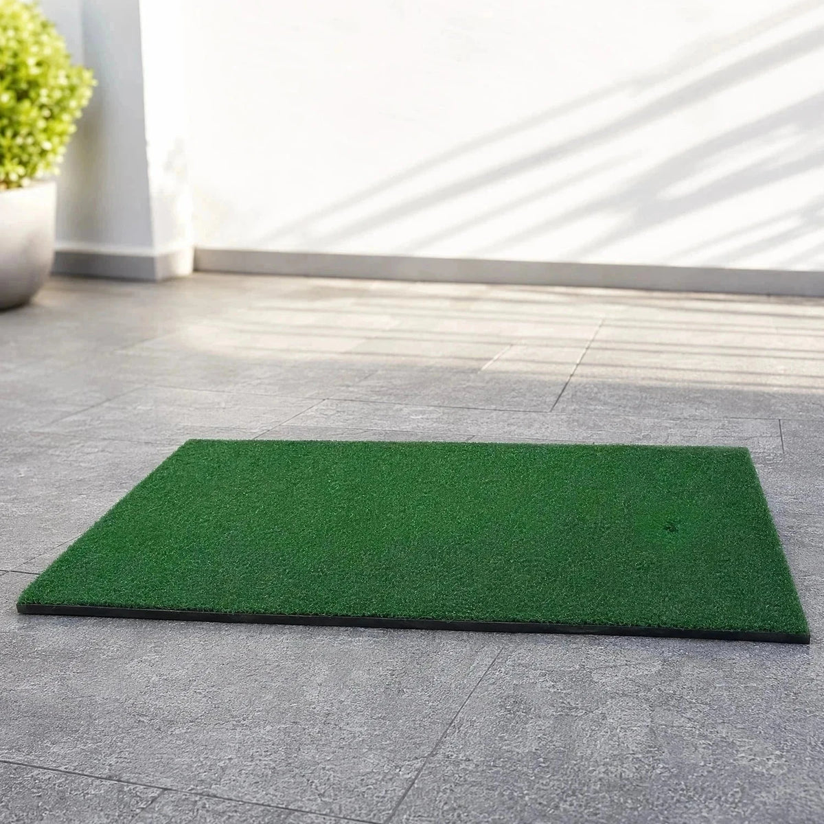 Golf Swing Practice Mat in green artificial turf with nylon and SBR material, rectangular and thin design for indoor and outdoor use