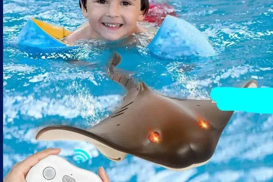 Remote control RC boat shaped like a manta ray on water