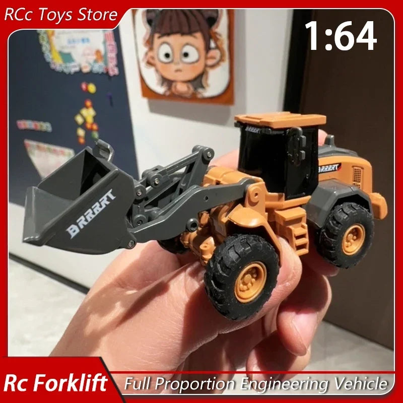 RC Bulldozer Mini scale 1:64 in orange and grey plastic with black tires and functional front loader held in hand